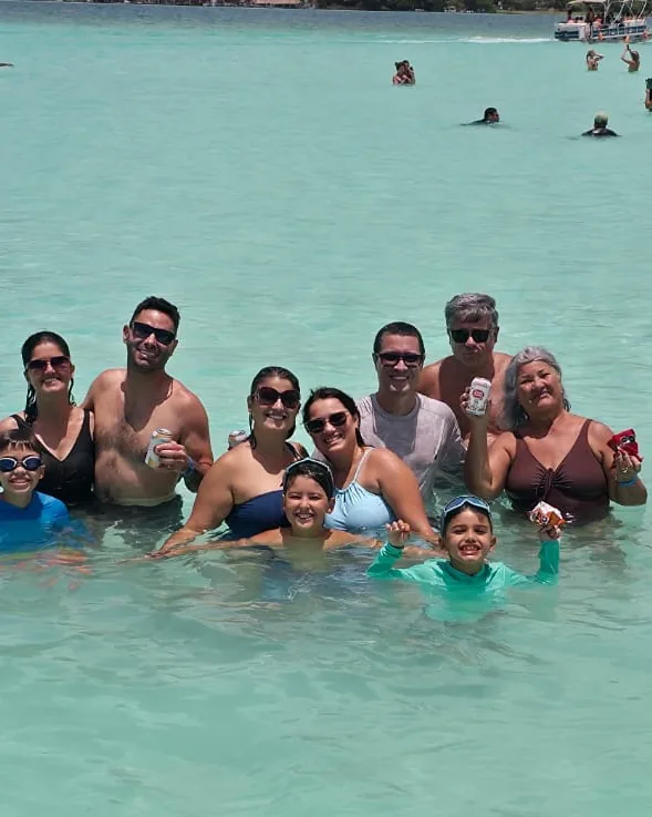 Visitors in the turquoise water of Bacalar Lagoon